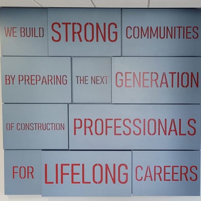 Photos of the WMCI values that are hung in the entry way to the institute