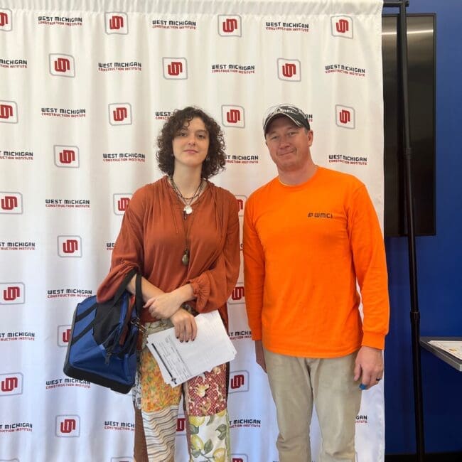 WMCI high school student Billie Beresford is receiving their certificate upon graduating from Carpentry I.