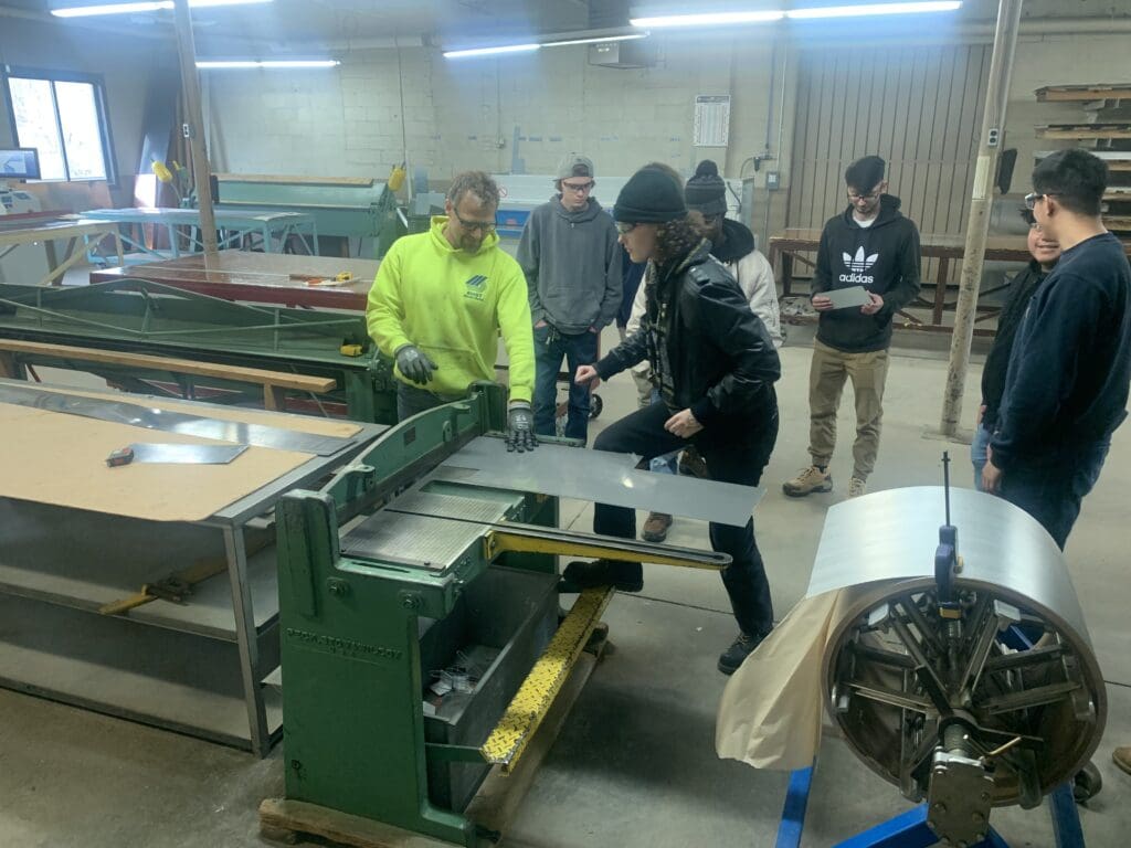 Billie Beresford is joined by fellow classmates on a field trip to Buist Sheet Metal.